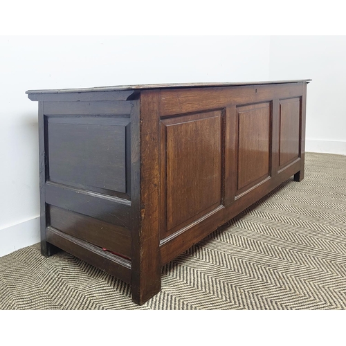 235 - COFFER, early 18th century Georgian oak, of large proportions with a rising lid and triple panelled ... 