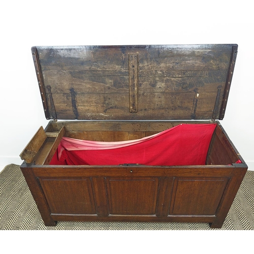 235 - COFFER, early 18th century Georgian oak, of large proportions with a rising lid and triple panelled ... 