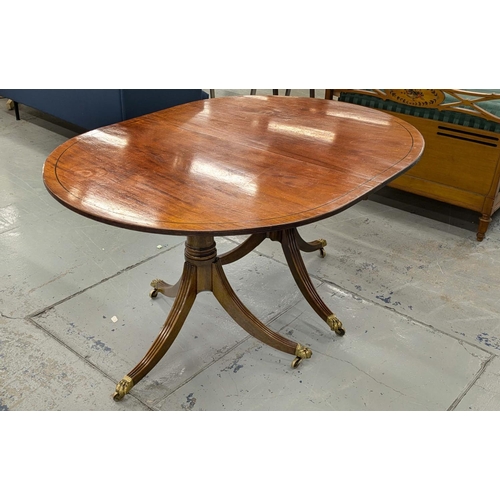 246 - TWIN PEDESTAL DINING TABLE, early 20th century Georgian style mahogany with elliptical ends and two ... 