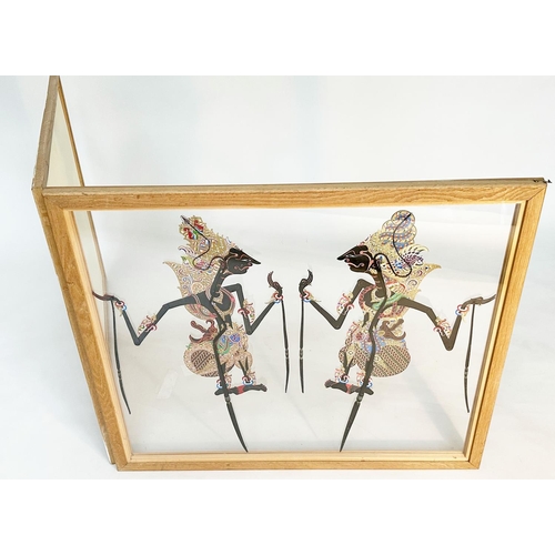 249 - JAVANESE SHADOW PUPPET STYLE CARTOON, hinged and framed, 94cm W x 79cm H.