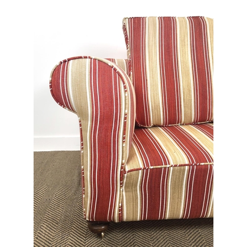 251 - CHESTERFIELD SOFA, early 20th century in terracotta and cream striped upholstery on brass castors, 7... 