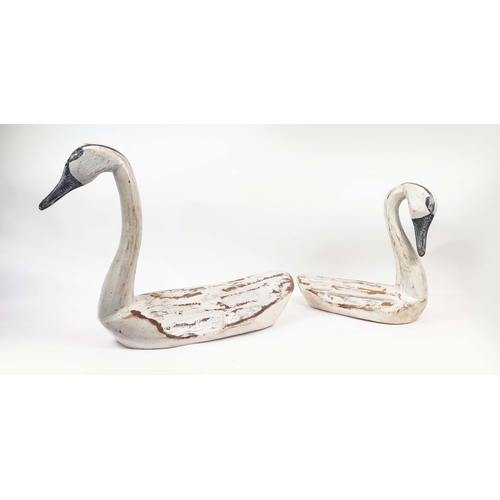 3 - SWANS, two, hand carved wood in a distressed finish, largest 85cm L x 45cm H. (2)