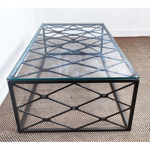 349 - COFFEE TABLE, with a glass top on a metal lattice frame, 76cm D x 140cm L x 47cm H.