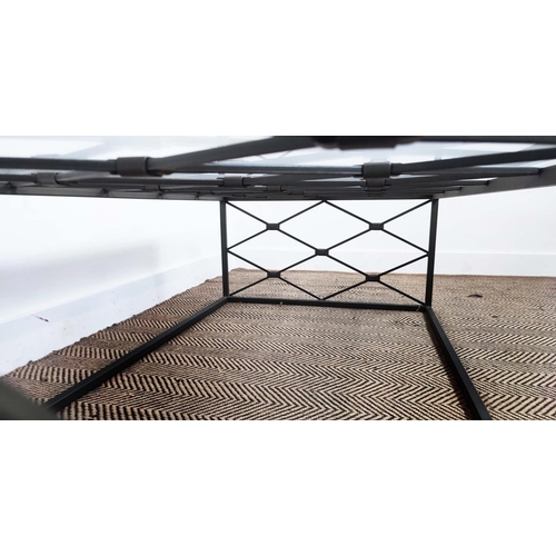 349 - COFFEE TABLE, with a glass top on a metal lattice frame, 76cm D x 140cm L x 47cm H.