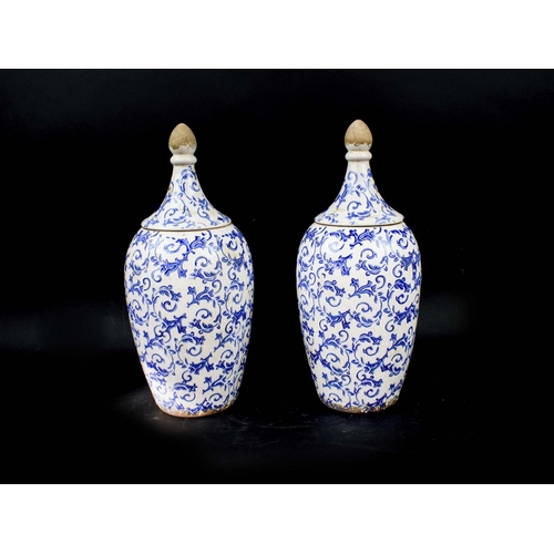 37 - TWO PAIRS OF BLUE AND WHITE PORCELAIN VASES AND CANISTERS WITH LIDS, 45cm H.(QTY 4)