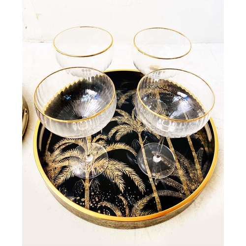 419 - DRINKS TRAYS, a pair, palm tree design, together with a set of eight wine glasses, trays, 40cm W x 4... 