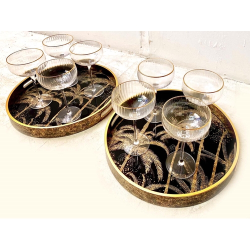 419 - DRINKS TRAYS, a pair, palm tree design, together with a set of eight wine glasses, trays, 40cm W x 4... 