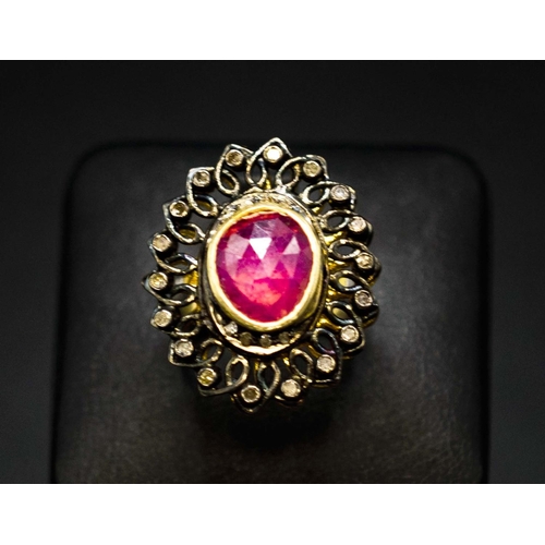 43 - SILVER GILT RUBY AND DIAMOND VINTAGE-STYLE DRESS RING, mixed oval rose-cut ruby 3.30ct. Diamonds 0.2... 