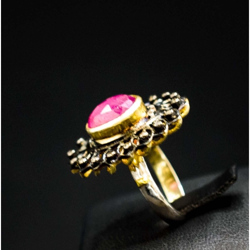 43 - SILVER GILT RUBY AND DIAMOND VINTAGE-STYLE DRESS RING, mixed oval rose-cut ruby 3.30ct. Diamonds 0.2... 