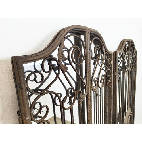 442 - ARCHITECTURAL WALL MIRRORS, a pair, metal garden gate frames, 151cm H x 60cm W. (2)