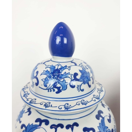 470 - URNS, a pair, blue and white with lids, each 41cm H. (2)