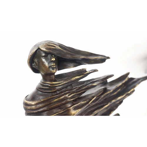 476 - CONTEMPORARY SCHOOL SCULPTURE, of a lady in the wind, in bronze, 38cm H x 40cm.