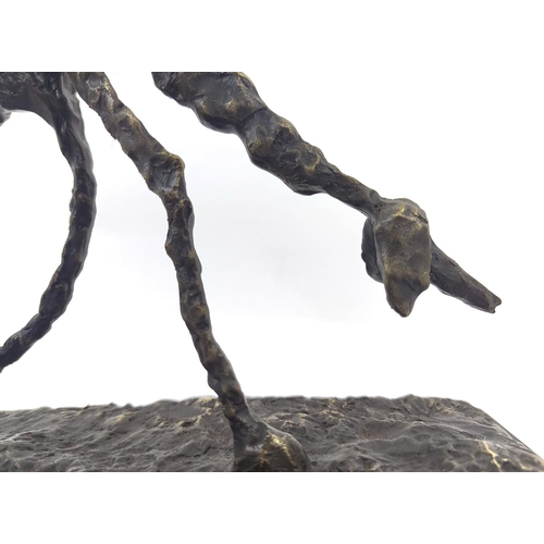 477 - CONTEMPORARY SCHOOL DOG SCULPTURE, in bronze, 38cm x 21cm H.