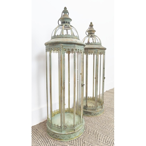 491 - LANTERNS, a pair, Regency style verdigris finish metal and glass, 83cm H x 27cm. (2)