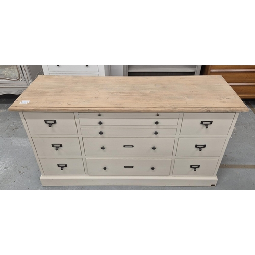 503 - BANK OF DRAWERS, with a pine top and painted base, 51cm x 63cm H x 156cm.