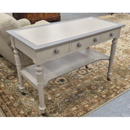 505 - PAINTED WASHSTAND/SIDE TABLE, with three frieze drawers and turned supports, 118cm x 54cm x 79cm.