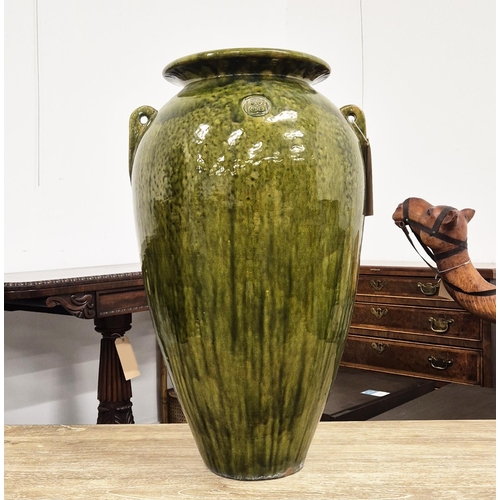 508 - URN, green glazed of large proportions, 72cm H x 43cm.