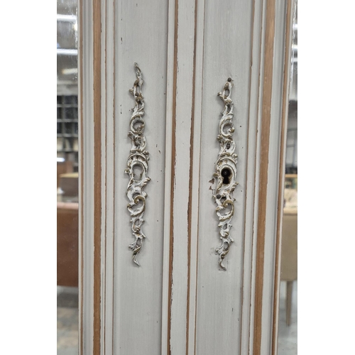 513 - ARMOIRE, distressed grey painted with white detail with a pair of bevelled mirrored doors.