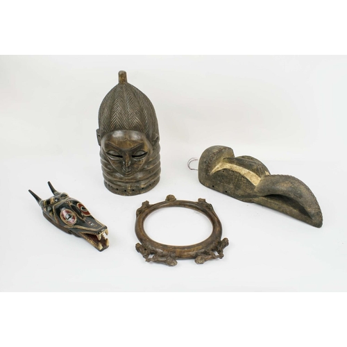 7 - MENDE HELMET MASK, a bird beak mask, a carved neck ring with monkey decoration and a guro mask. (4)