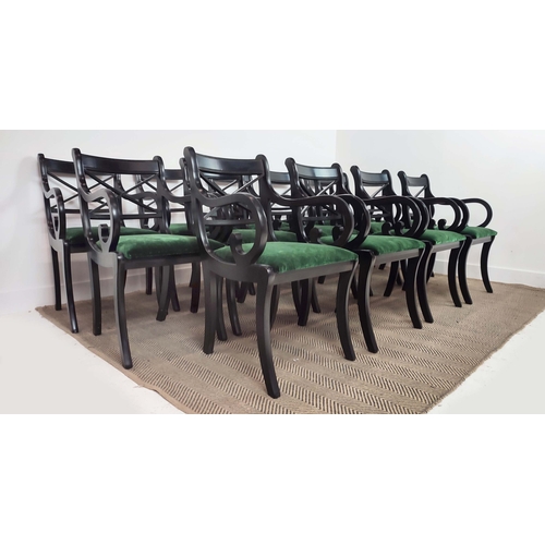 167 - DINING CHAIRS, a set of fourteen Regency style, ebonised with scroll arms and green velvet drop in s... 