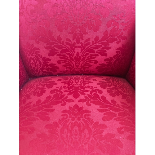 169 - ARMCHAIRS, a pair, Edwardian satin walnut in red damask on brass castors, 97cm H x 64cm W. (2)