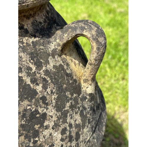 196 - GARDEN PLANTER, well weathered terracotta with loop handles and incised detail, 73cm H.