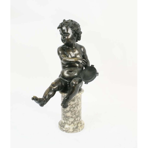 1 - BRONZE PUTTI, 19th century seated playing a tambourine perched on a circular pedestal, 55cm H.