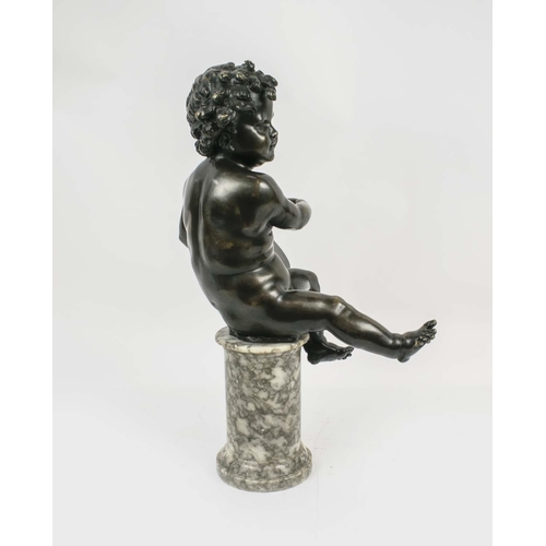 1 - BRONZE PUTTI, 19th century seated playing a tambourine perched on a circular pedestal, 55cm H.