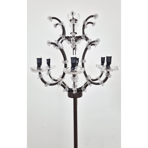 402 - TIMOTHY OULTON FLOOR LAMP, with a metal stem and frame top.