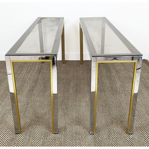 431 - RENATO ZEVI CONSOLE TABLES, a pair, Italian 1970s chrome and gilt metal with smoked glass tops, 73cm... 