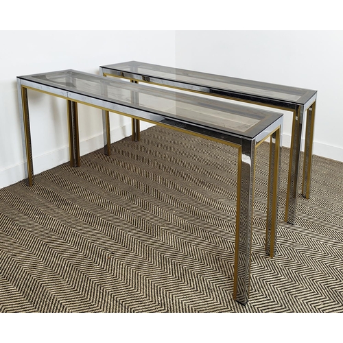 431 - RENATO ZEVI CONSOLE TABLES, a pair, Italian 1970s chrome and gilt metal with smoked glass tops, 73cm... 