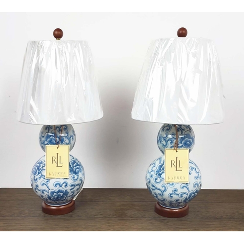 438 - LAUREN RALPH LAUREN HOME TABE LAMPS, a pair, glazed blue and white ceramic, with shades, 53cm H appr... 