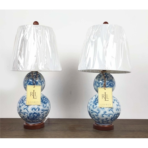 438 - LAUREN RALPH LAUREN HOME TABE LAMPS, a pair, glazed blue and white ceramic, with shades, 53cm H appr... 