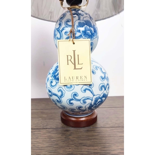 438 - LAUREN RALPH LAUREN HOME TABE LAMPS, a pair, glazed blue and white ceramic, with shades, 53cm H appr... 