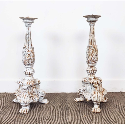 454 - CAST METAL CANDLESTICKS, a pair, 66cm H. (2)