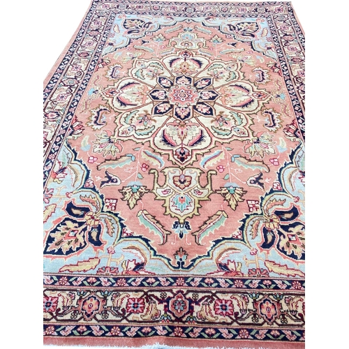 84 - PERSIAN HERIZ CARPET, 290cm x 194cm.