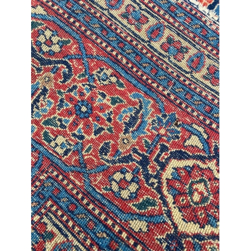 86 - ANTIQUE TABRIZ HERATI DESIGN CARPET, 335cm x 240cm.