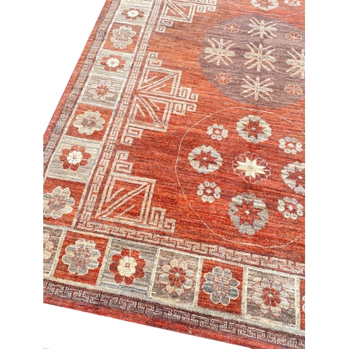 88 - FINE KHOTAN RUG, 240cm x 170cm.