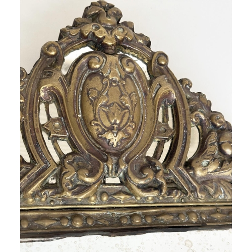 109 - WALL MIRRORS, a near pair, late/early 20th century Dutch style repoussé silvered, each with cushion ... 