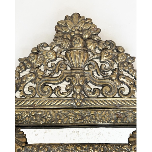 109 - WALL MIRRORS, a near pair, late/early 20th century Dutch style repoussé silvered, each with cushion ... 