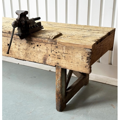 129 - WORK BENCH/TABLE, early 20th century exceptionally long planked pine with enclosed ends, 317cm W x 7... 