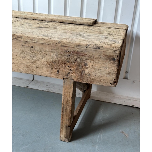 129 - WORK BENCH/TABLE, early 20th century exceptionally long planked pine with enclosed ends, 317cm W x 7... 