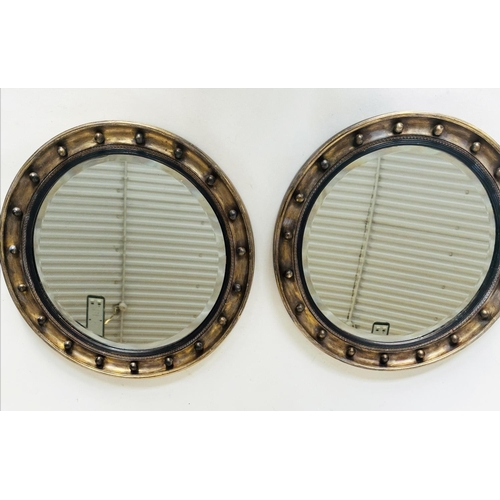 102 - WALL MIRRORS, a pair, Regency style giltwood and gesso each with bevelled mirror, ebonised slip and ... 