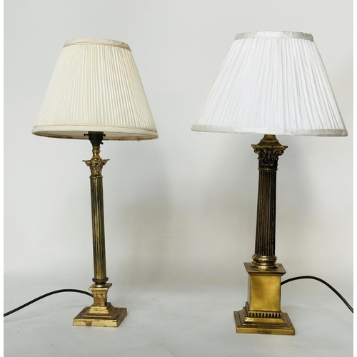 107 - COLUMN TABLE LAMPS, neo classical gilt metal each Corinthian capped with stepped plinth bases and pl... 