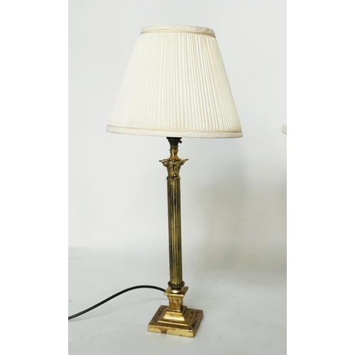 107 - COLUMN TABLE LAMPS, neo classical gilt metal each Corinthian capped with stepped plinth bases and pl... 