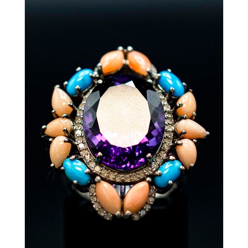 22 - COLOURFUL SILVER RING SET WITH A CENTRAL OVAL AMETHYST SURROUNDED BY DIAMONDS, pink coral and turquo... 