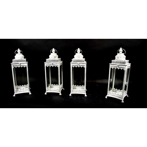 447 - STORM LANTERNS, a set of four, 46.5cm H. (4)