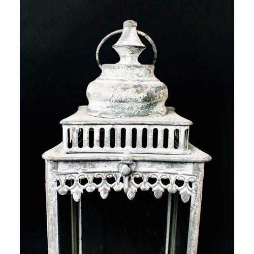 447 - STORM LANTERNS, a set of four, 46.5cm H. (4)