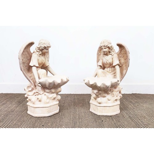 453 - KNELLING ANGELS HOLDING SHELLS, a pair, faux stone. (2)