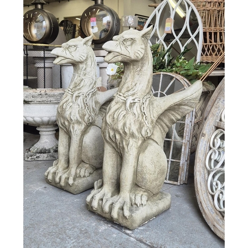 457 - SCULPTURAL GRIFFINS, a pair, composite stone, 77cm H. (2)